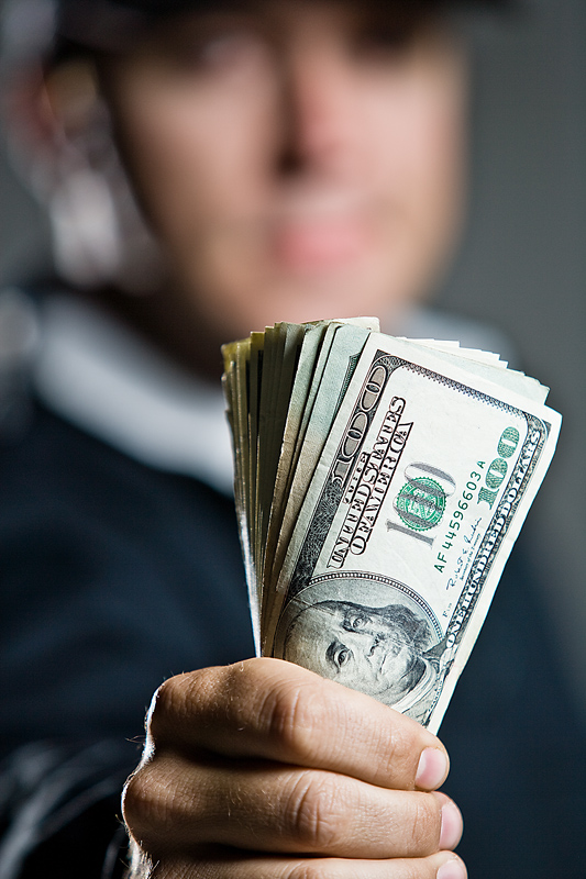 This is a picture of a man holding money